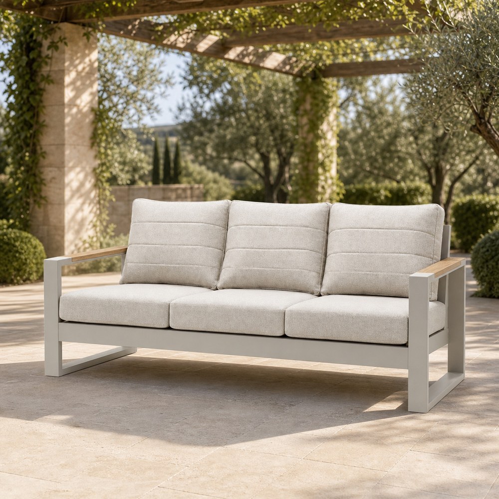 Three-seater aluminium outdoor sofa with wood armrests and cream cushions