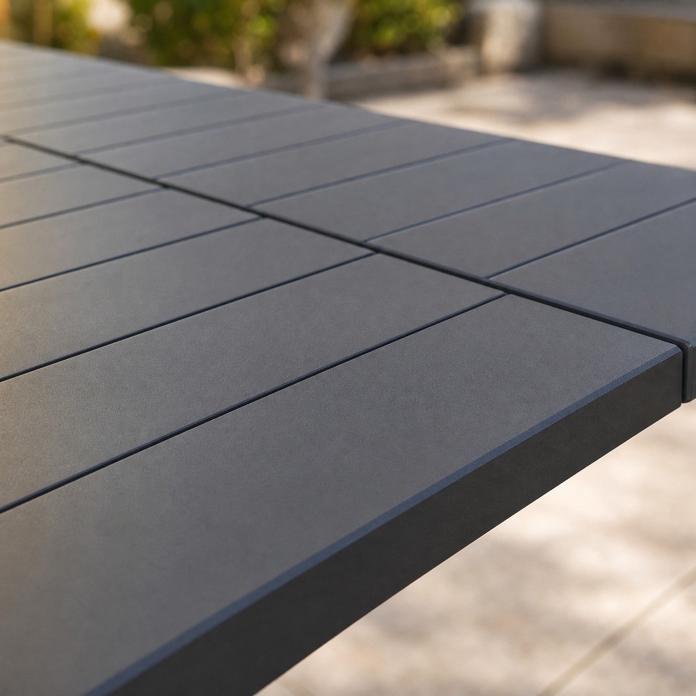 Aluminium slat table top with the slat seams running along the table
