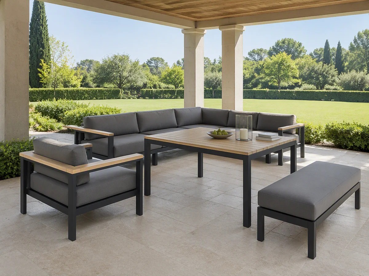 Six-piece outdoor lounge set with corner sofa, single sofa and armless sofa around a low half-height table under a garden pavilion