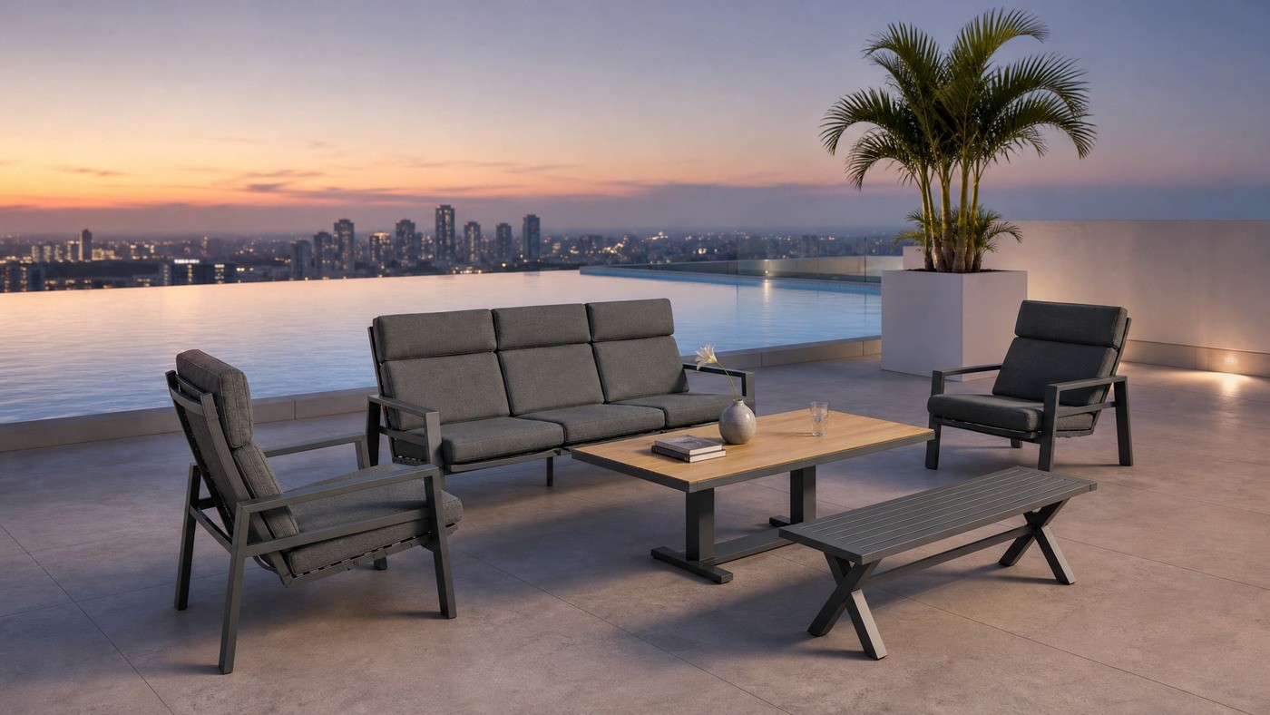 Aluminium five-piece outdoor lounge set on a rooftop terrace at dusk