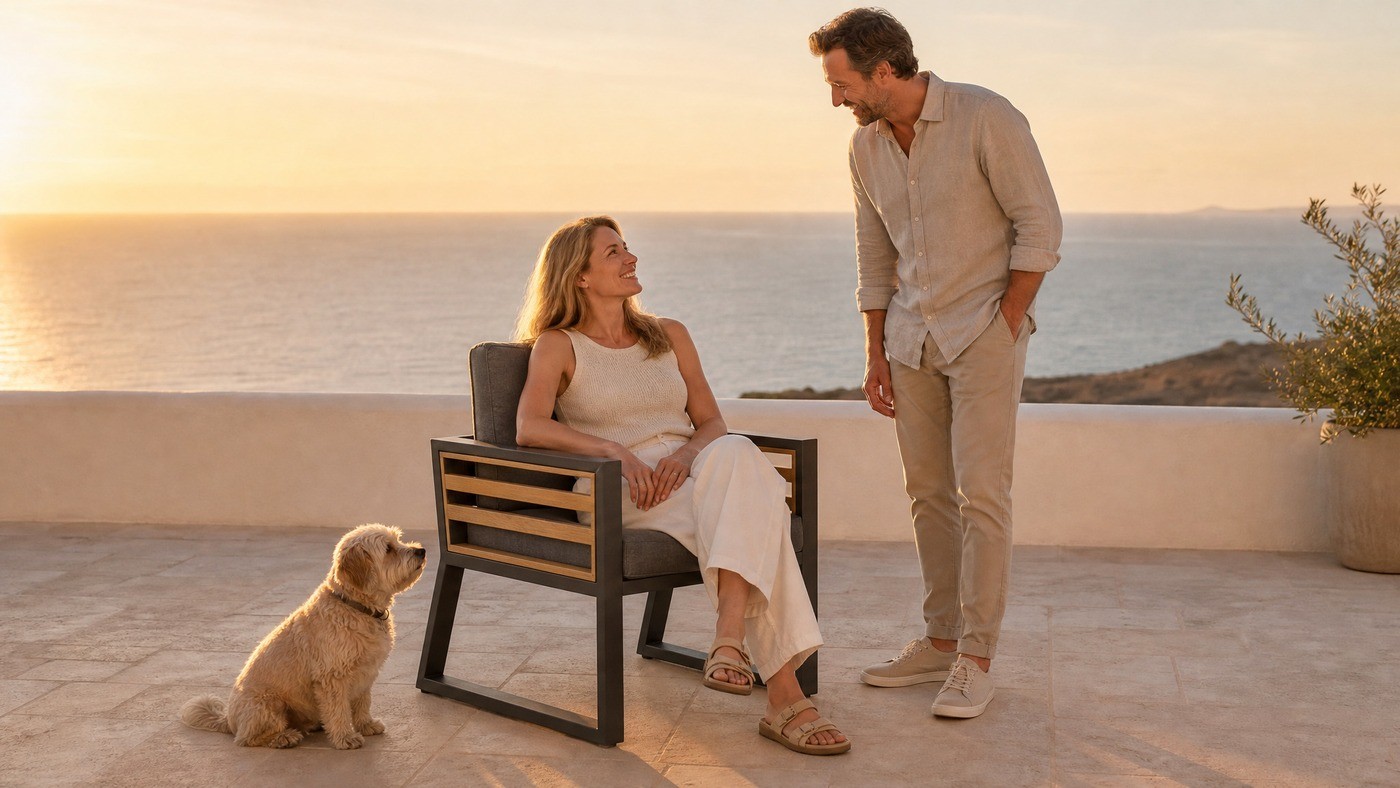 All-aluminium garden armchair on a sea view terrace at golden hour