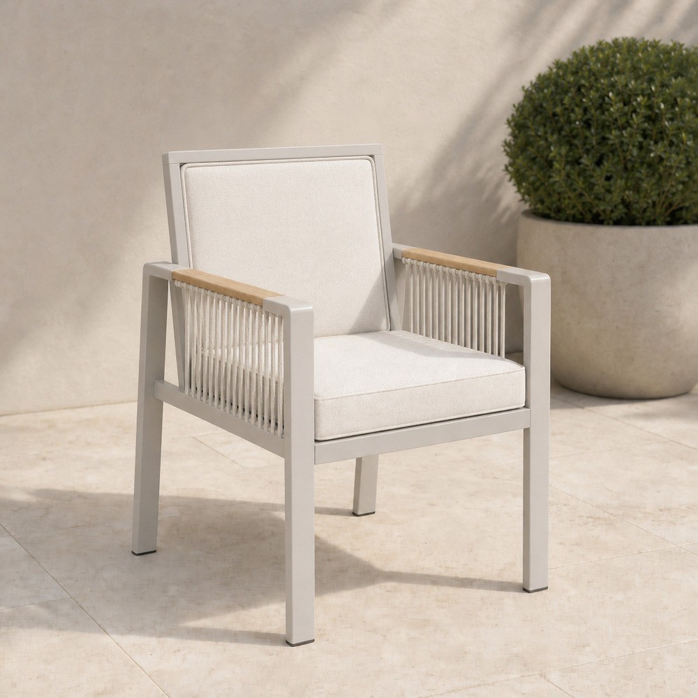 Round dining set with six chairs on a rooftop terrace at dusk