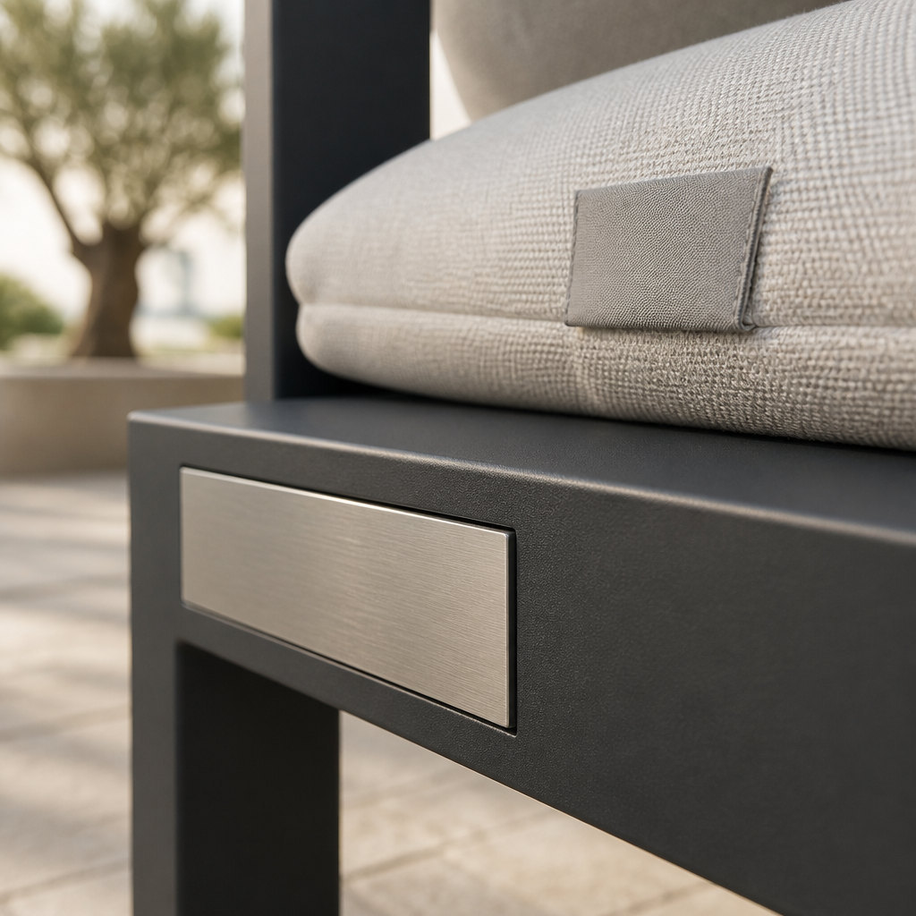 A blank brushed metal nameplate on the frame and a blank woven label on the cushion edge, showing where a brand mark is applied