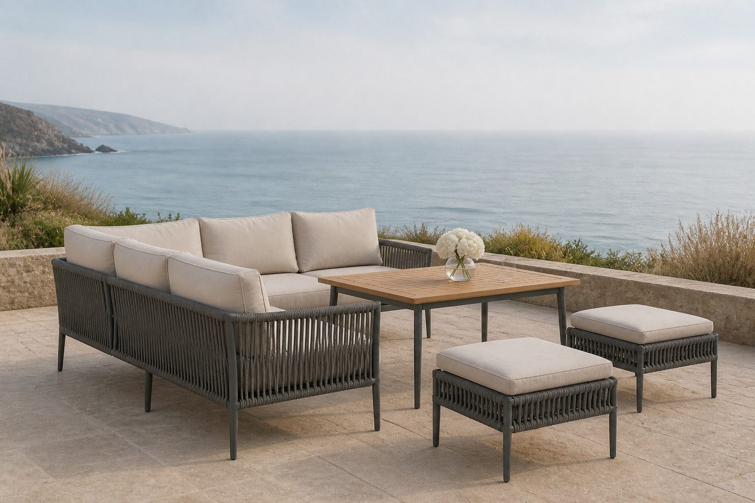 Aluminium and rope weave outdoor furniture on a sea-facing terrace
