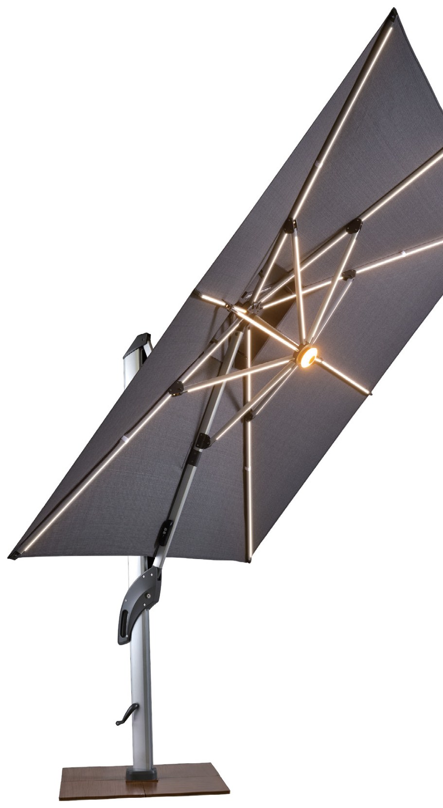 Cantilever umbrella tilted at an angle with LED ribs lit at dusk