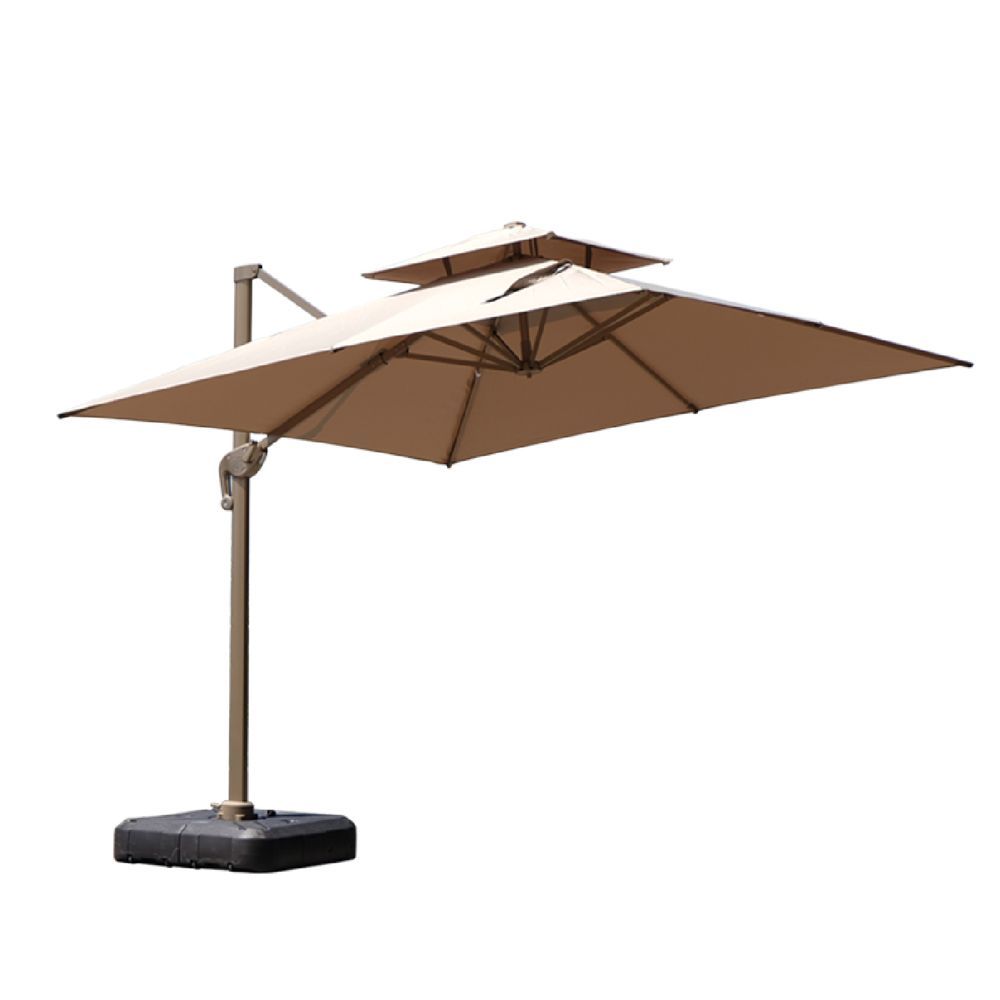 Cantilever umbrella with an offset arm and double canopy