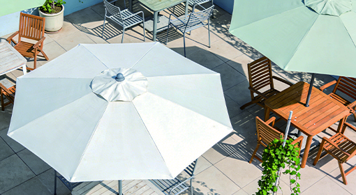 Patio Umbrella Size and Shape Guide A diagram showing different umbrella sizes and the corresponding table sizes they can shade.