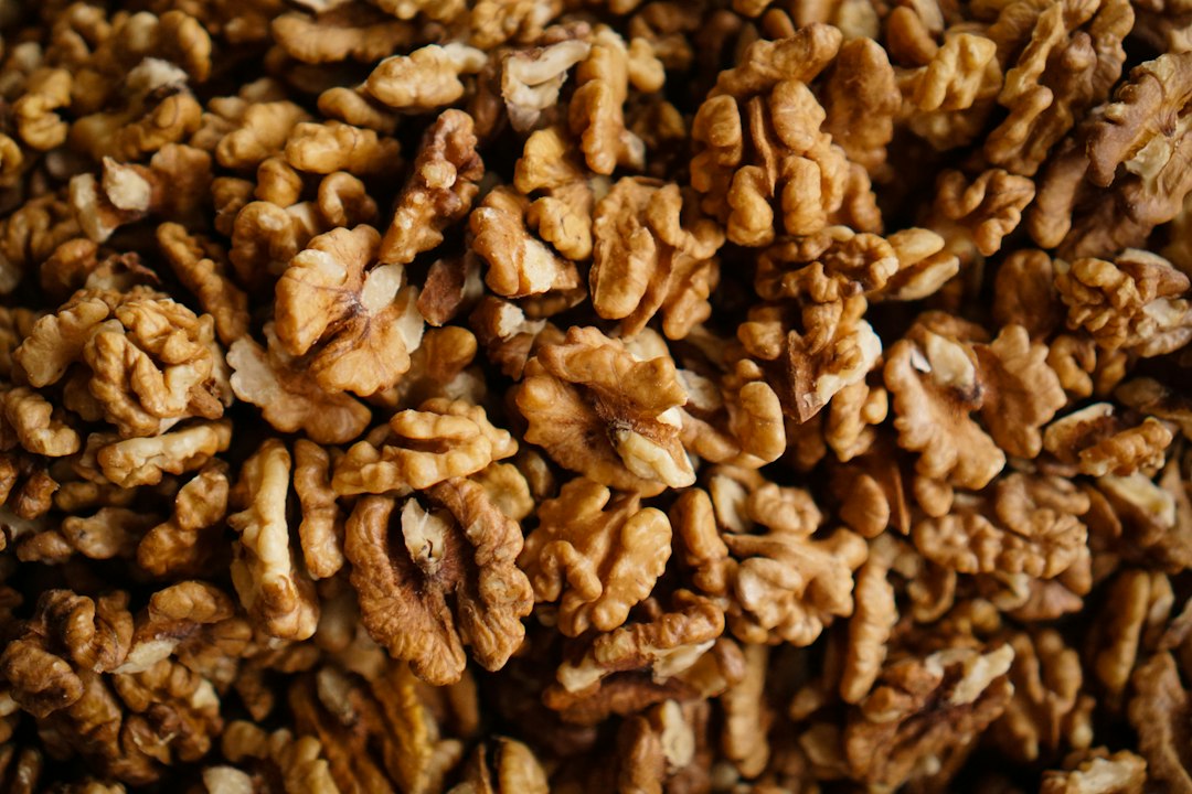 A close-up of different grades of high-quality walnut kernels