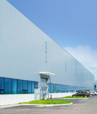 Durable curtain wall facade for industrial building