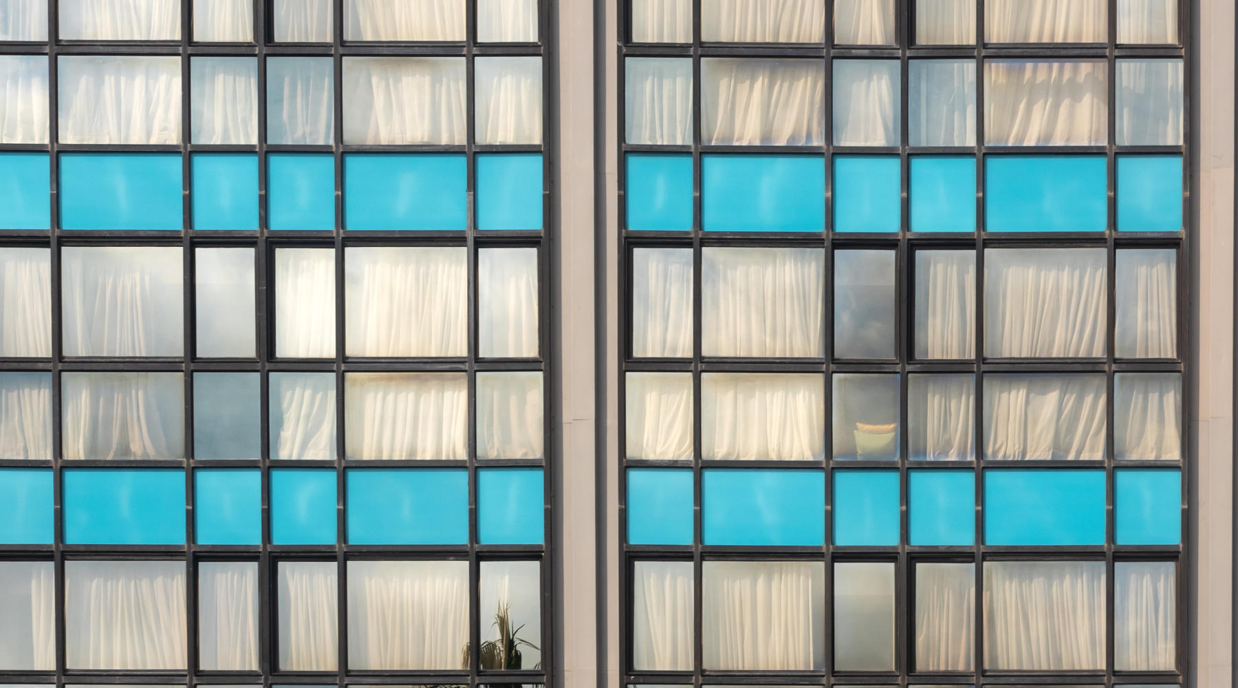 Unitized glass curtain wall system on a high-rise public building