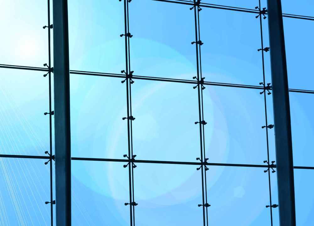 Point-fixed glass curtain wall system on a large public building