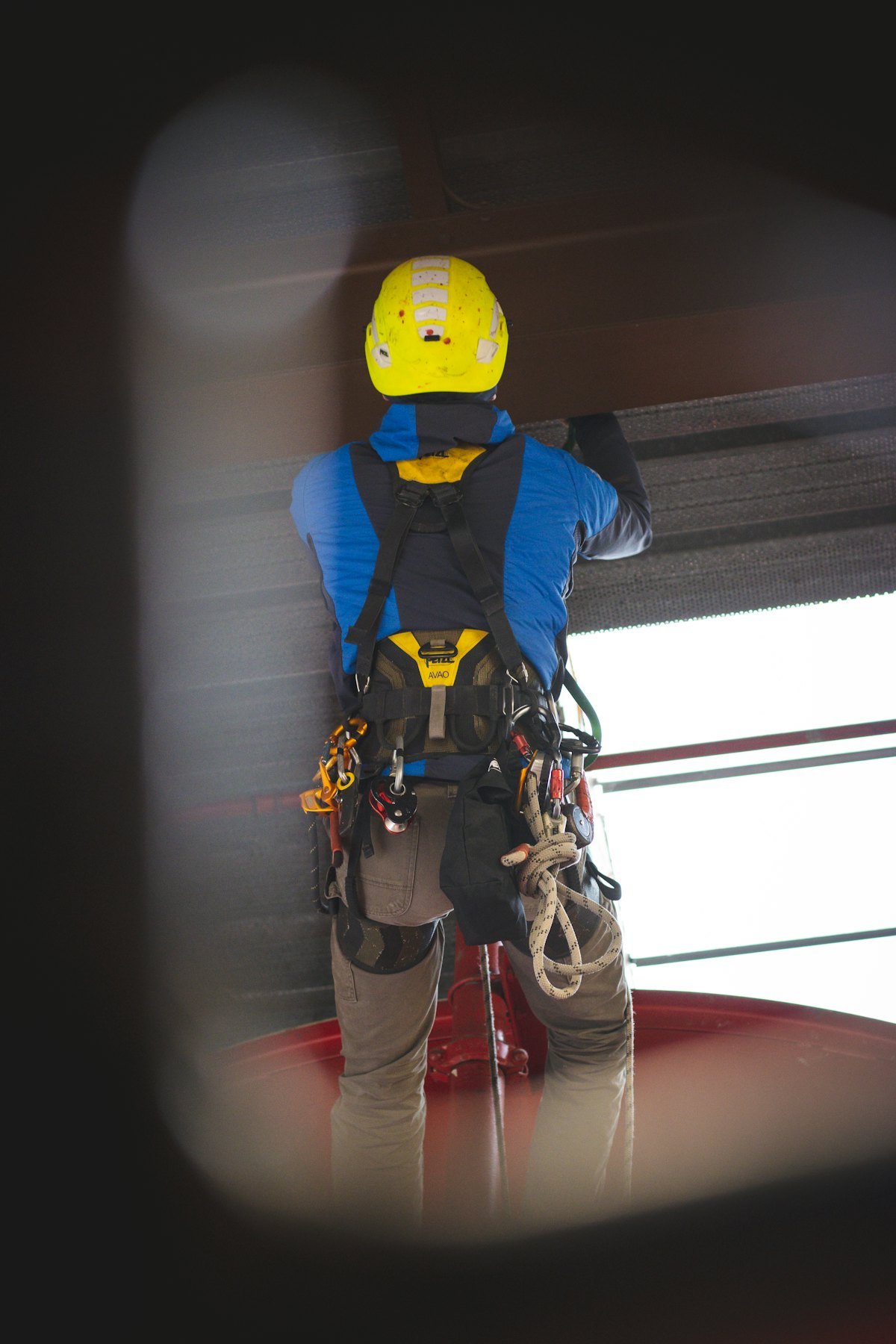 Rope-access worker wearing professional safety equipment