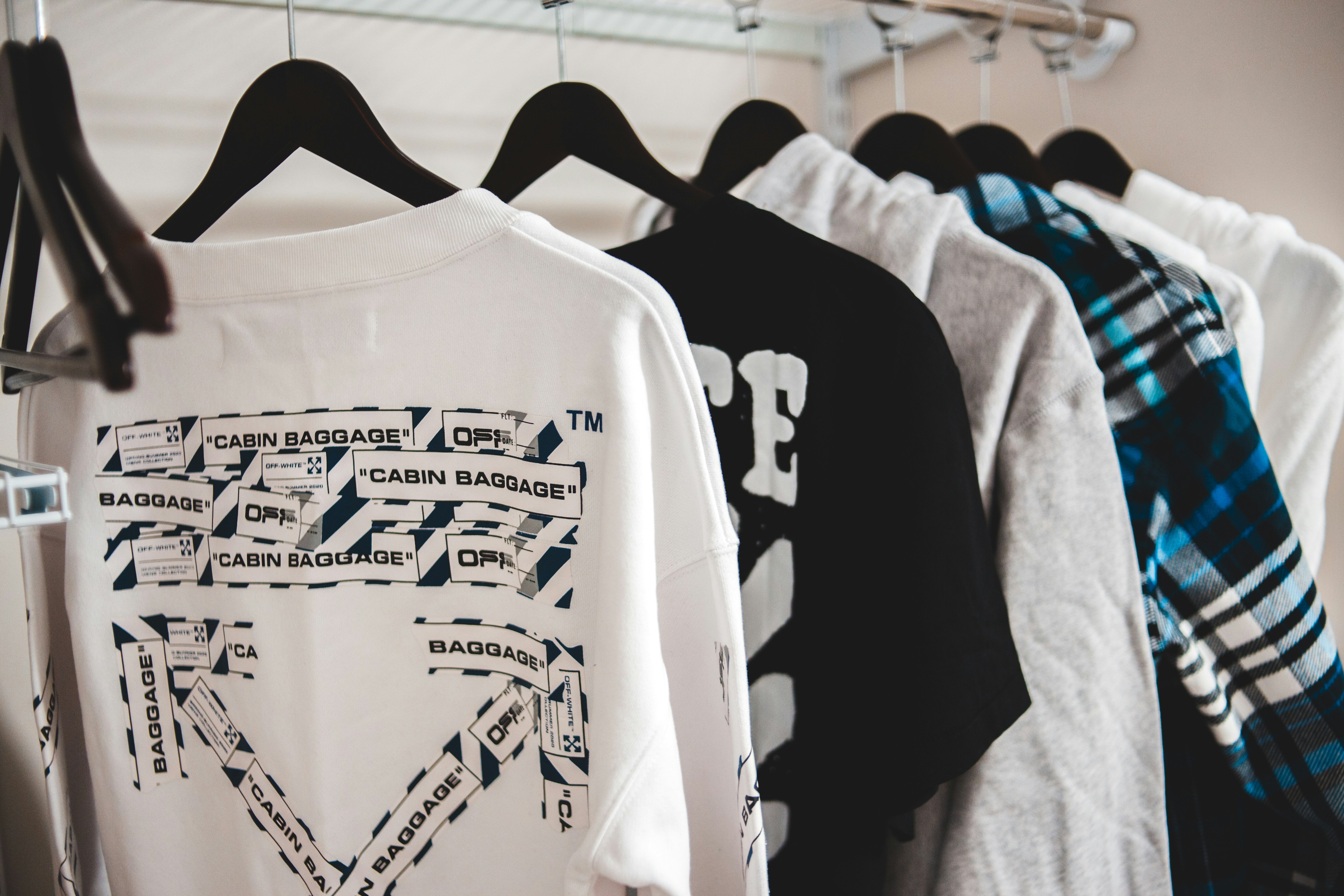 A collection of streetwear staples like hoodies, graphic tees, and sneakers arranged stylishly