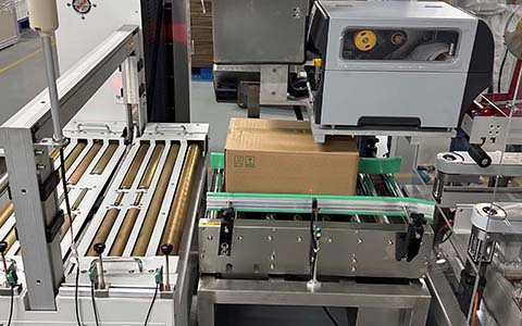 End-of-line integration with labeling, scanning, and dimensioning