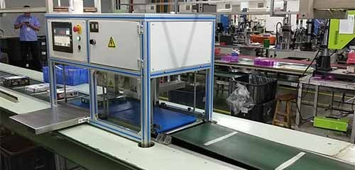 In-line Checkweigher to Boxed Toys
