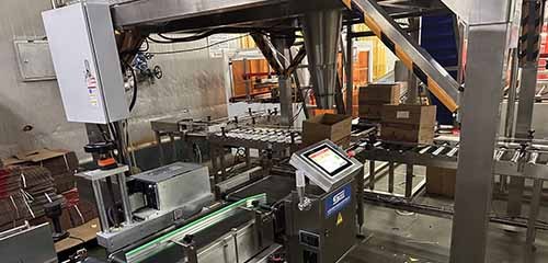 Weigh Price Labeller to Vacuum-Packed Sausage Cartons