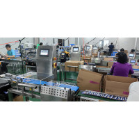 Inline Checkweighing of Game Card Packaging with Air-Blow Rejection