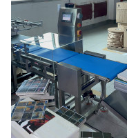 Application Case: Inline Checkweighing of Printed Materials with Drop Rejection System