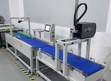 A checkweigher system integrated with code scanning and labeling