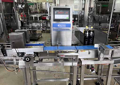 Bottled product checkweighers are used for heavy bottled liquids