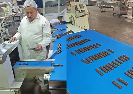 Conveyor belt metal detectors used in chocolate bar production lines