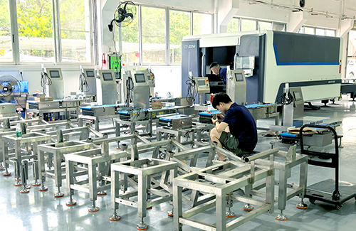 Samegram technicians test checkweighers