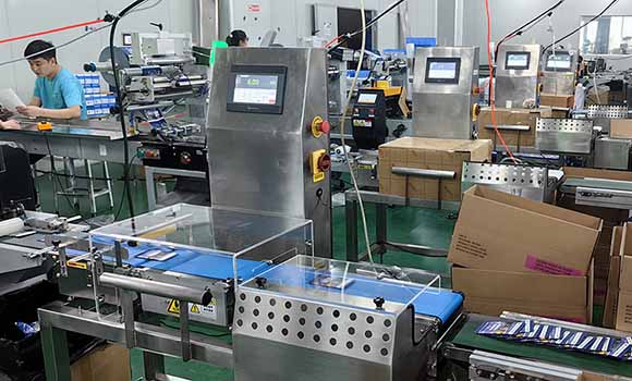 Inline Checkweighing for Game Card Packaging