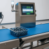 How Dynamic Checkweighers Boost Efficiency in Fruit Processing Plants