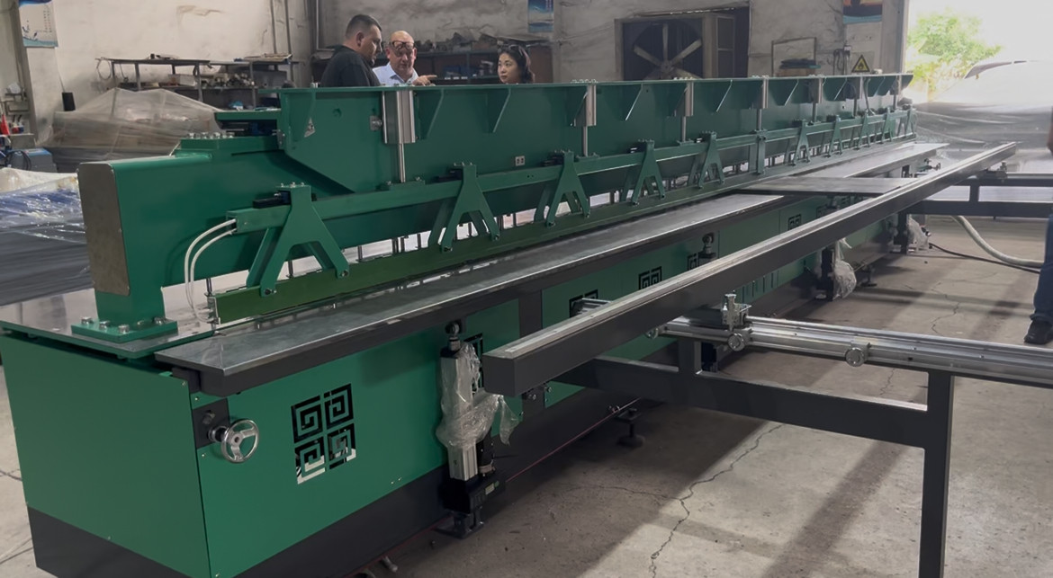 UK customer inspecting 6.5-meter plastic sheet bending machine at Weissenberg factory