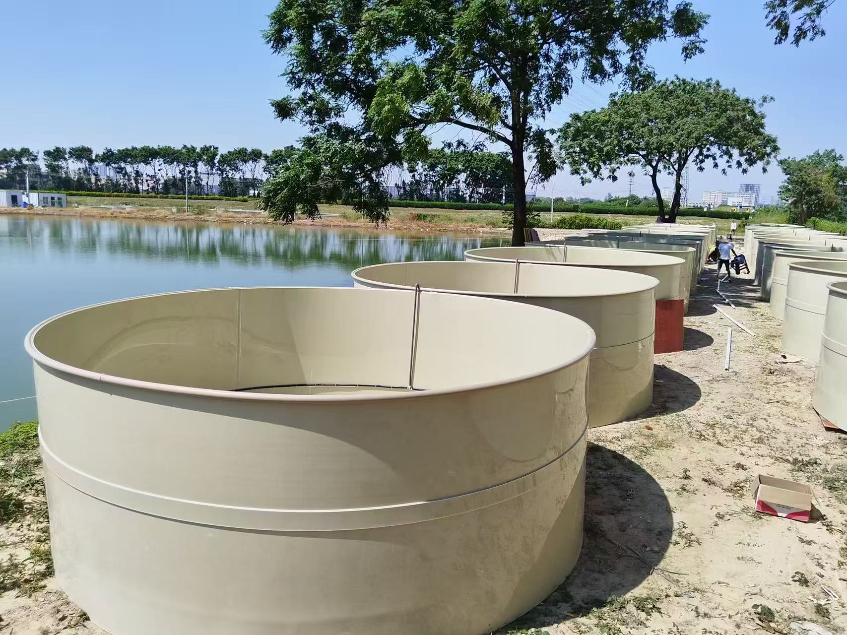 Fabricated plastic tanks for fish farming and aquaculture water storage built from welded HDPE sheet