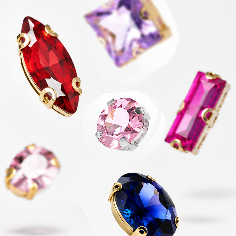 Assorted custom claw rhinestones with prong settings in different colors