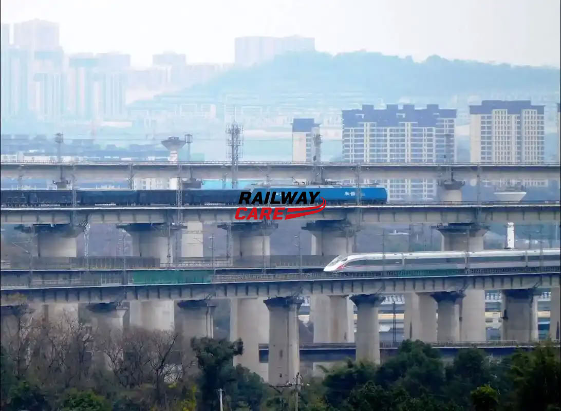 Why are there crushed stones beneath conventional train tracks, while high-speed rail tracks have none?