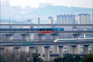 Why are there crushed stones beneath conventional train tracks, while high-speed rail tracks have none?
