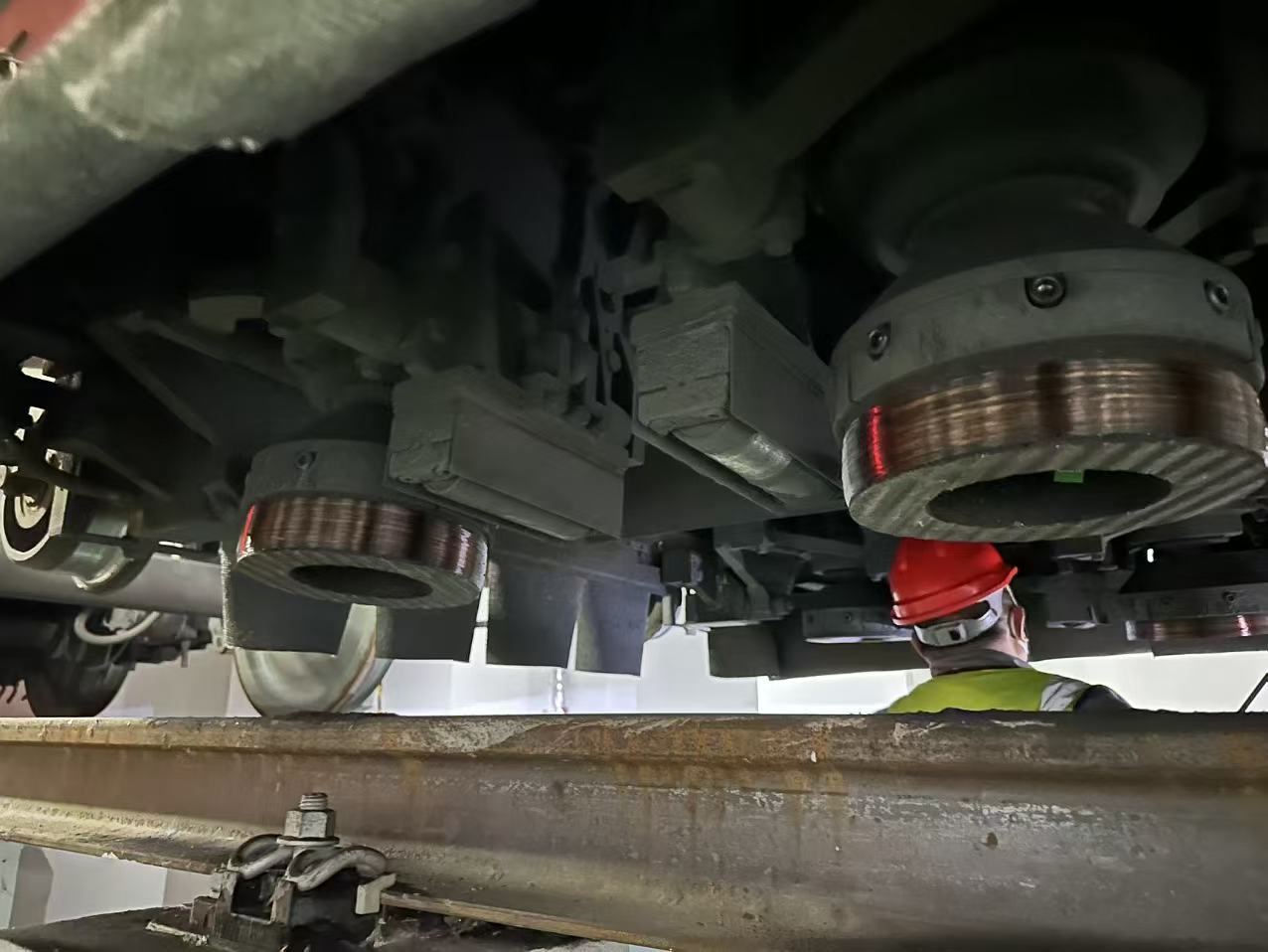 Close-up of railway grinder wheels on grinding vehicle