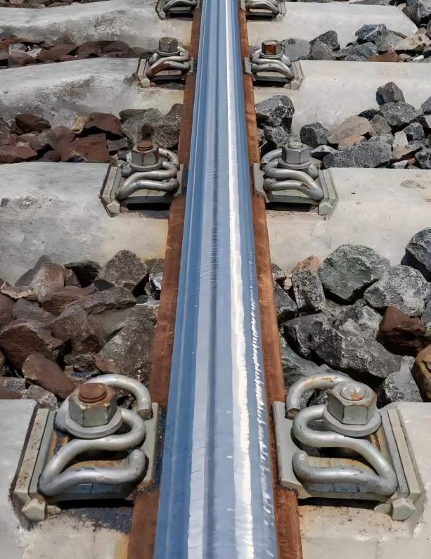Polished rail surface after grinding with railway grinder wheel