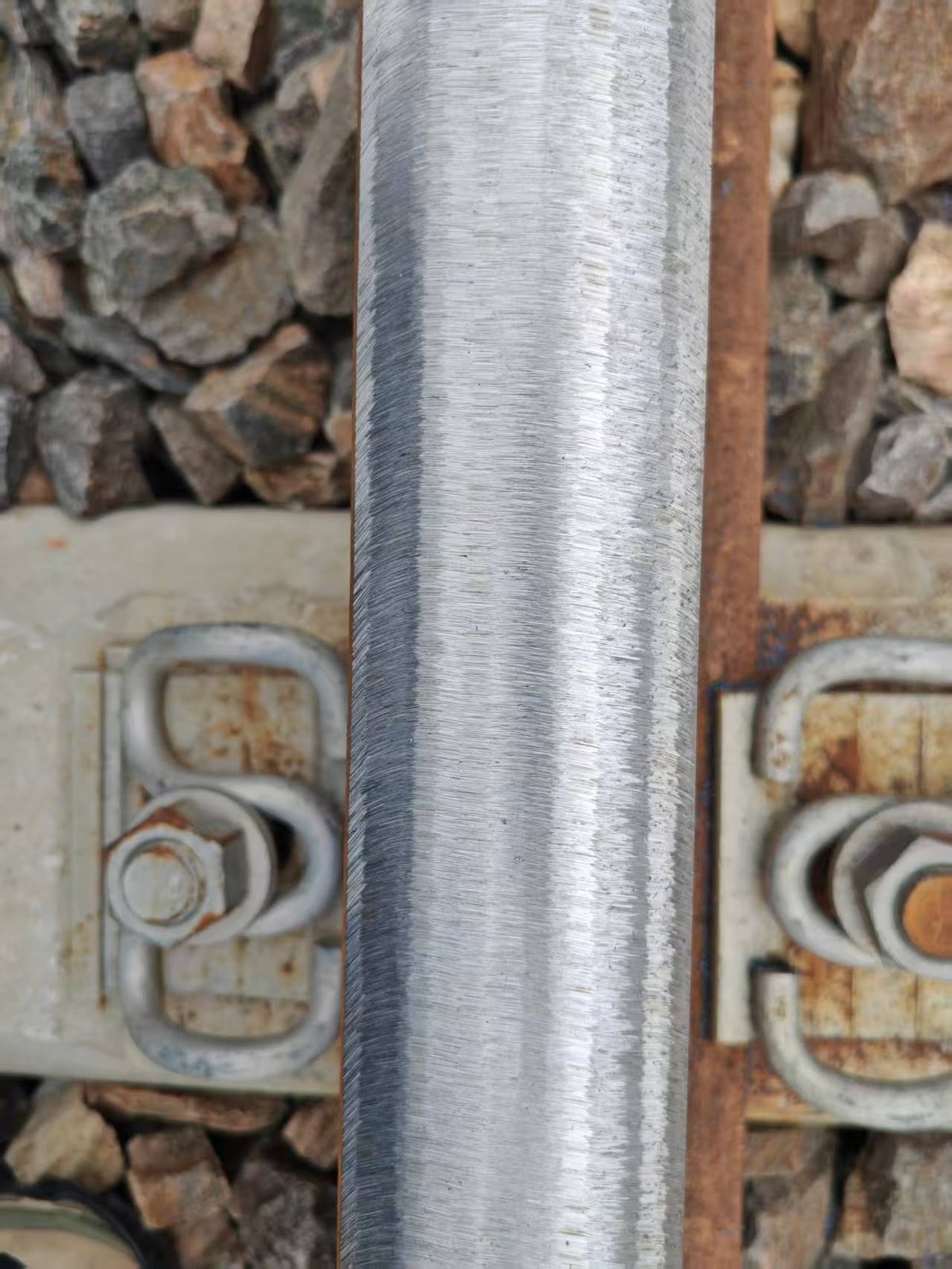 rail grinding to remove corrugation