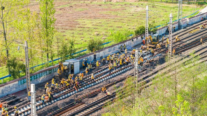railroad track maintenance tools and equipment on a work site