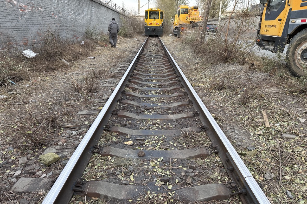 rail grinding works on an industrial rail line during a scheduled maintenance campaign