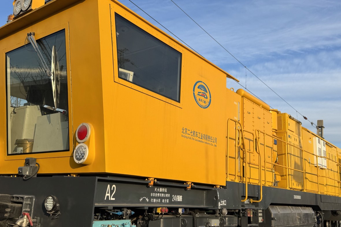 rail grinding machine on an industrial rail line, the kind of work that decides whether a vehicle is needed
