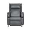 Push-back reclining wheelchair with four swivel locks.