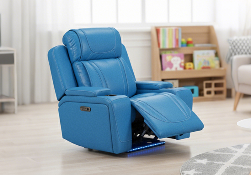 Blue kid recliner shown fully reclined with the footrest extended in a child's bedroom
