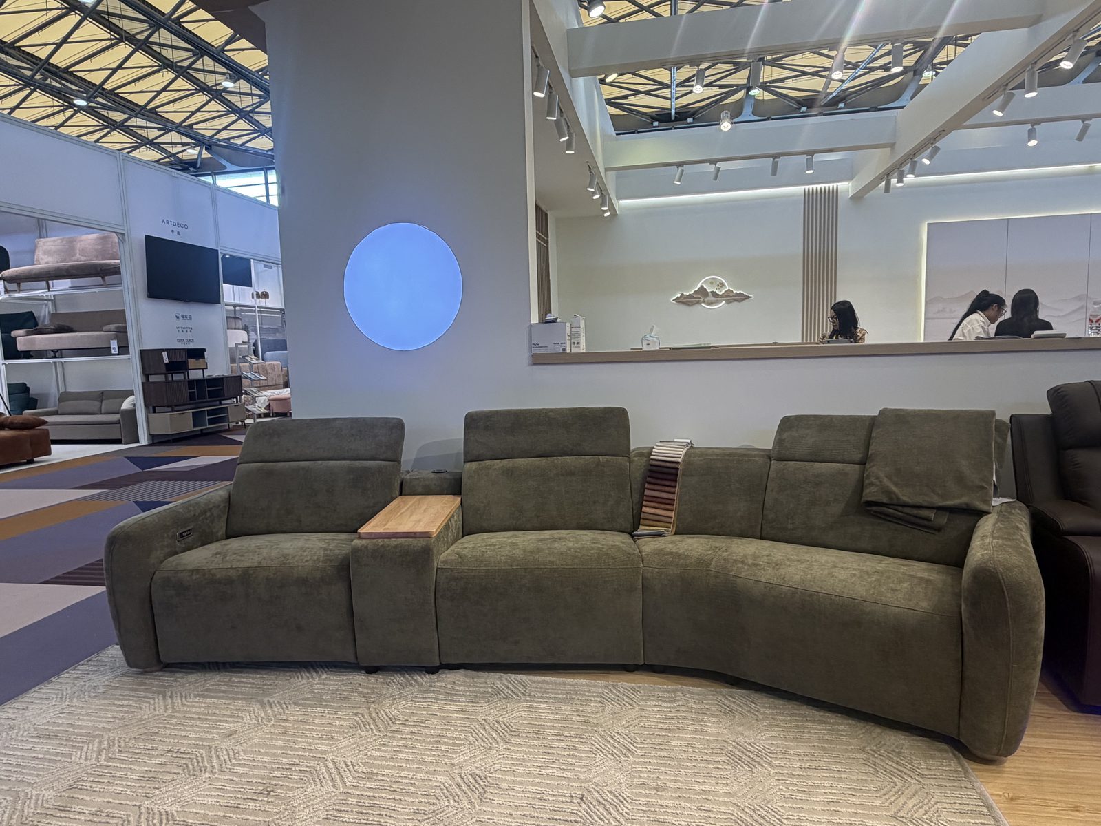8556 olive suede-effect curved modular recliner with timber console panel
