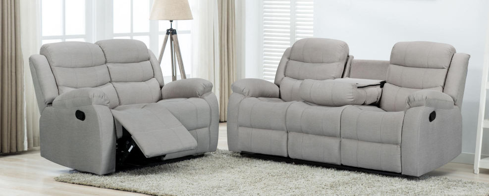 Light grey recliner pair in a living room