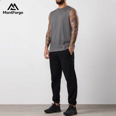 Custom Minimalist Plain Sleeveless Shirt Supplier | Blank Men's Cotton Muscle Sleeveless Tee Manufacturer