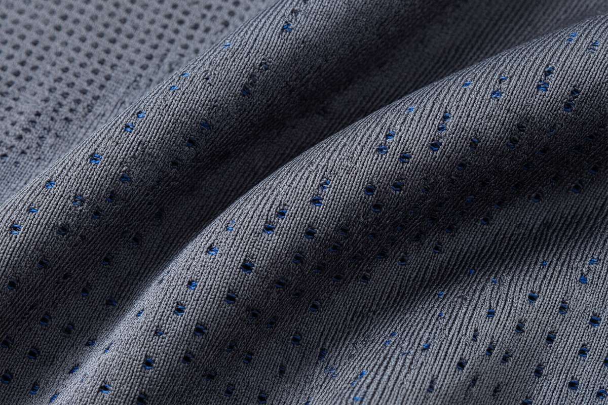 Seamless knit sportswear garment showing minimal stitching and ergonomic construction