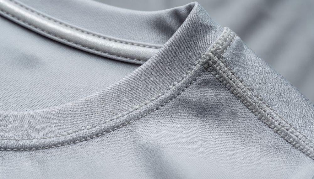 Quality Benchmarks: How to Completely Eliminate Fabric Torque and Neckline Stretching in Mass Production