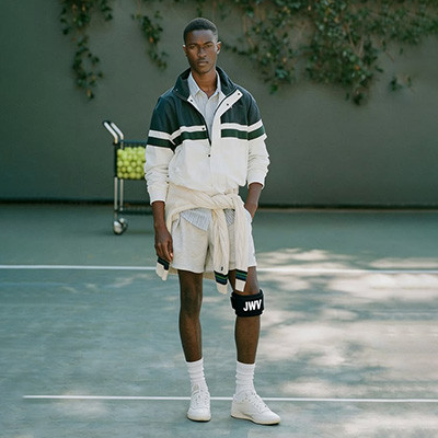 Athlete on tennis court during summer training session