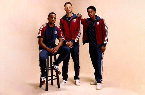 Athletes wearing coordinated custom teamwear uniforms
