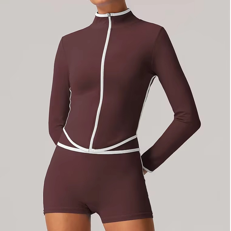 Tummy control fitted yoga jacket in dark brown with contrast seams shown on model