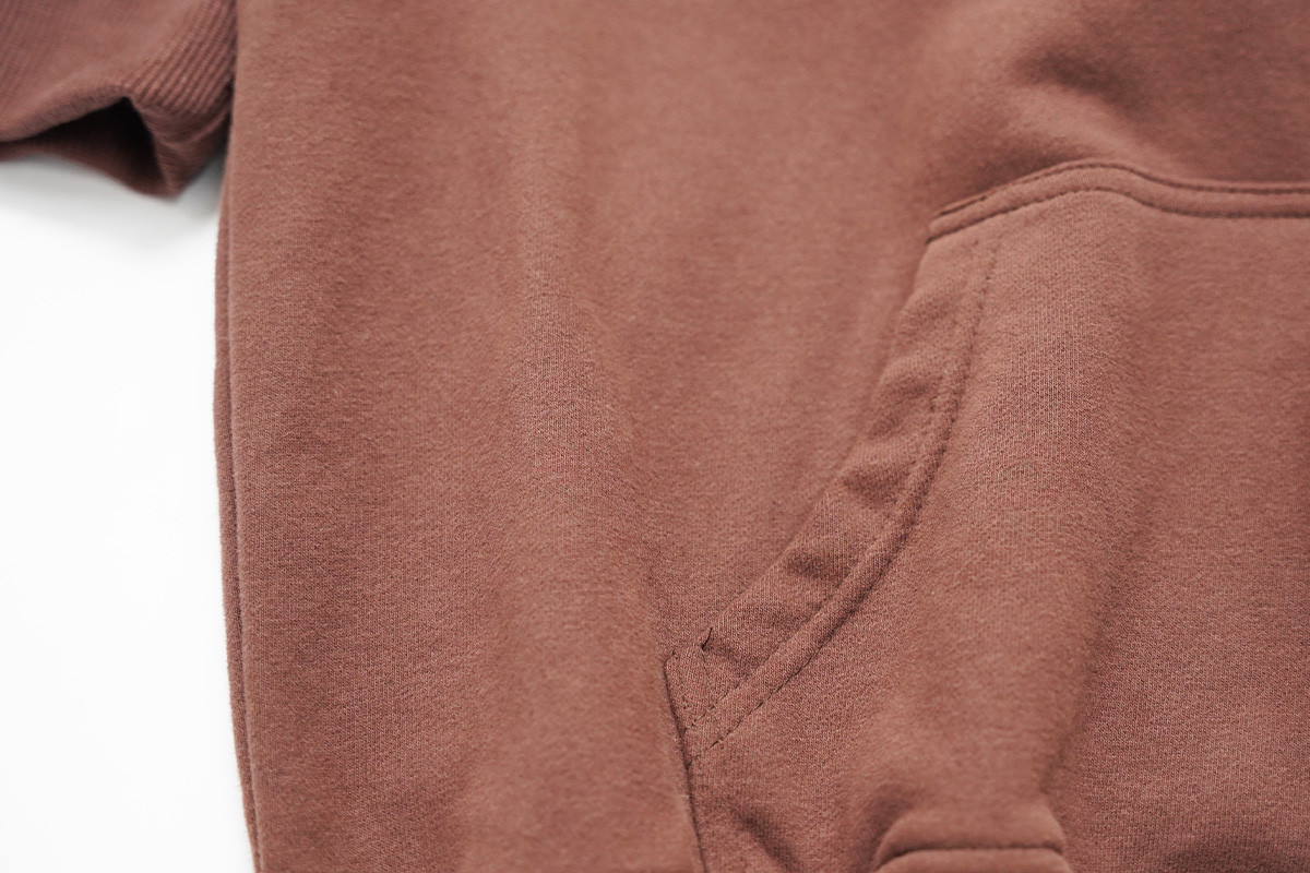 High-waisted blue leggings with hidden side pocket and human-centered design details